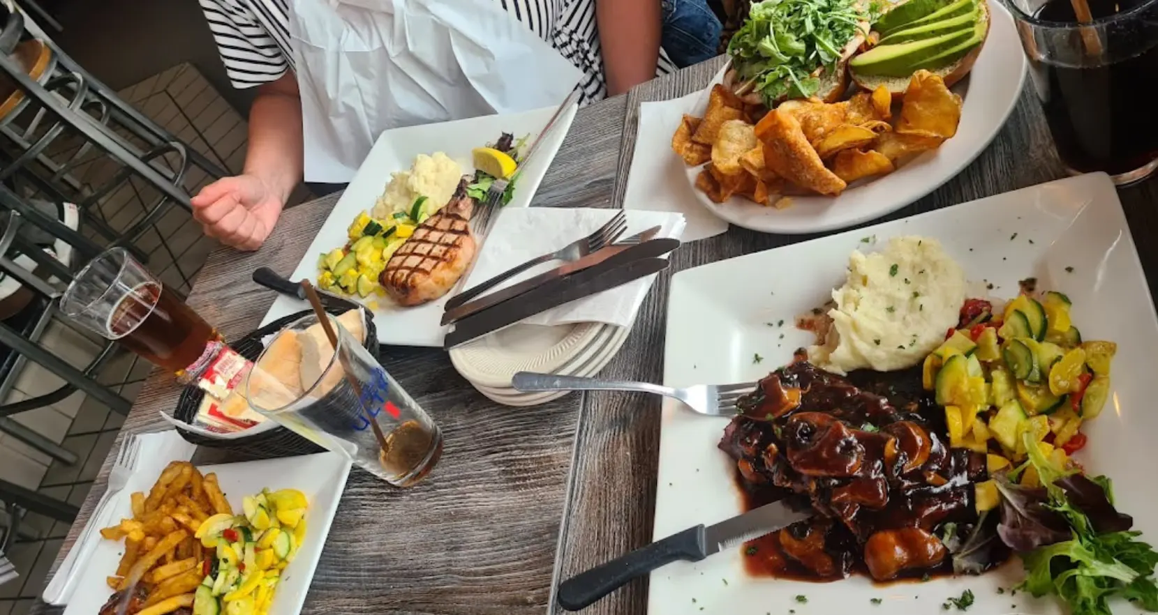Dinner and sandwiches on a table at Juliano's